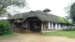 Exterior view of Ammachi Kottaram with wrap-around veranda