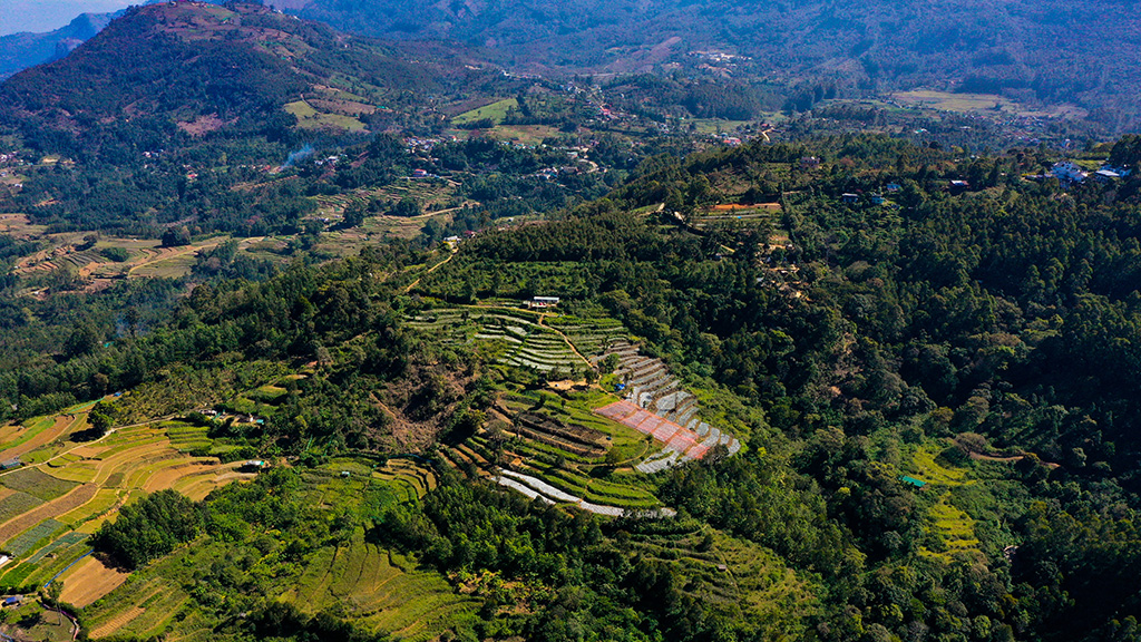 Kanthalloor hill station landscape with fruit orchards