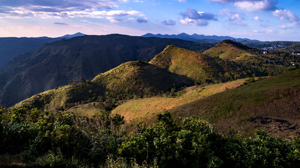 Parunthumpara viewpoint surrounded by tea, coffee, and cardamom plantations 